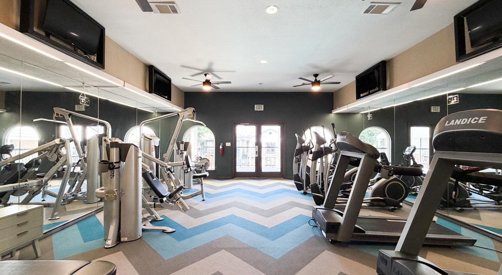 a gym with treadmills