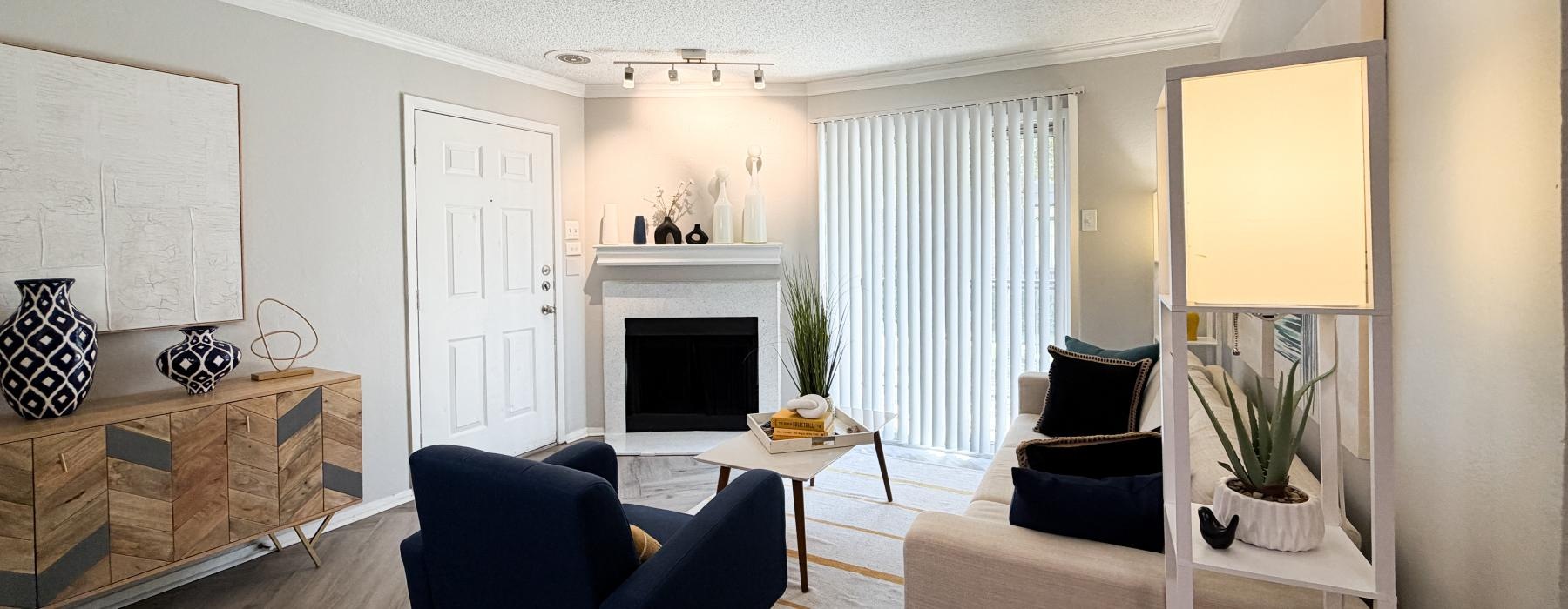 a living room with a fireplace